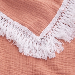 Peach swaddle blanket with tassels for newborn photography