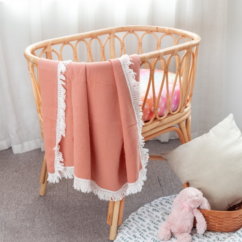 Peach swaddle blanket with tassels for newborn photography
